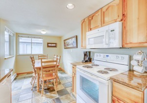 Ideal first-floor getaway with hot tub, fireplace, & balcony - walk to lifts in Whistler