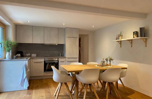 Au Apartment | Bergmomente Au – Holiday Apartment with Private Garden and Mountain Views