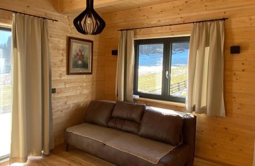 Hermagor-Pressegger See Apartment | Entspannen im Holzchalet mit Panoramablick, Ruhe und Infrarotsauna