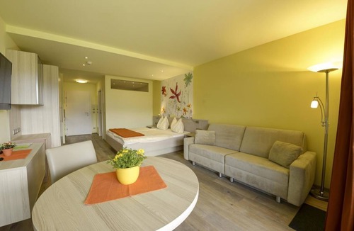 Drobollach am Faakersee House | Junior Suite mit Seeblick Typ A1 - Seepark Drobollach