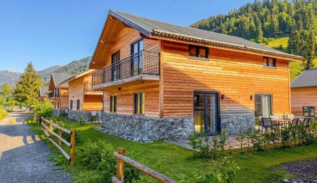 Chalet with terrace and sauna on an Alpine lake