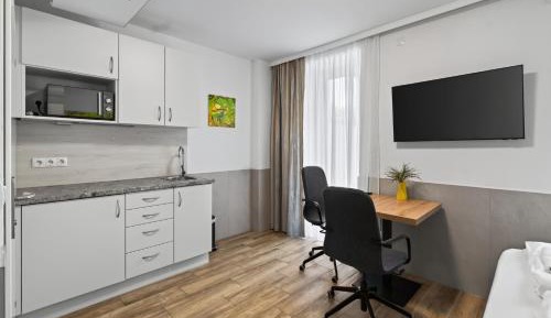 Business Souterrain Studio with Garden-Terrace