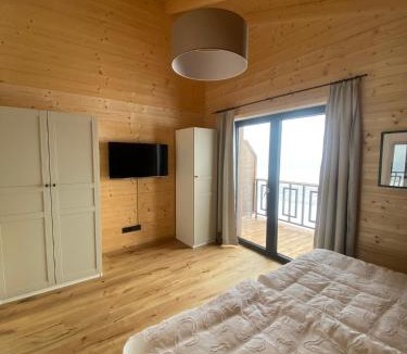 Hermagor-Pressegger See Apartment | Entspannen im Holzchalet mit Panoramablick, Ruhe und Infrarotsauna