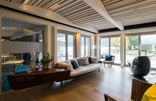 Neusach Hotel | Strandhotel am Weissensee