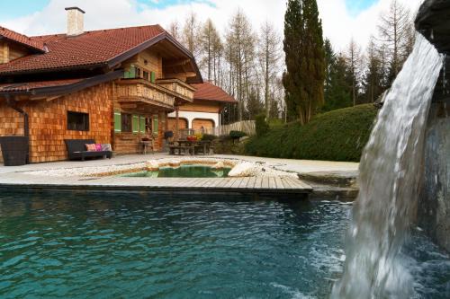 Luxury Chalet with Swimming Pond Nature Escape Upper Austria